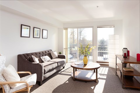 a living room with a couch and a coffee table